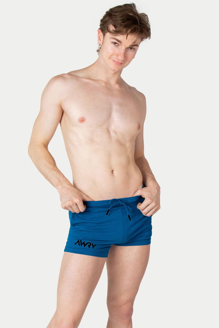 Cerulean blue shorts with drawstring waist and AVRY branding on the leg.