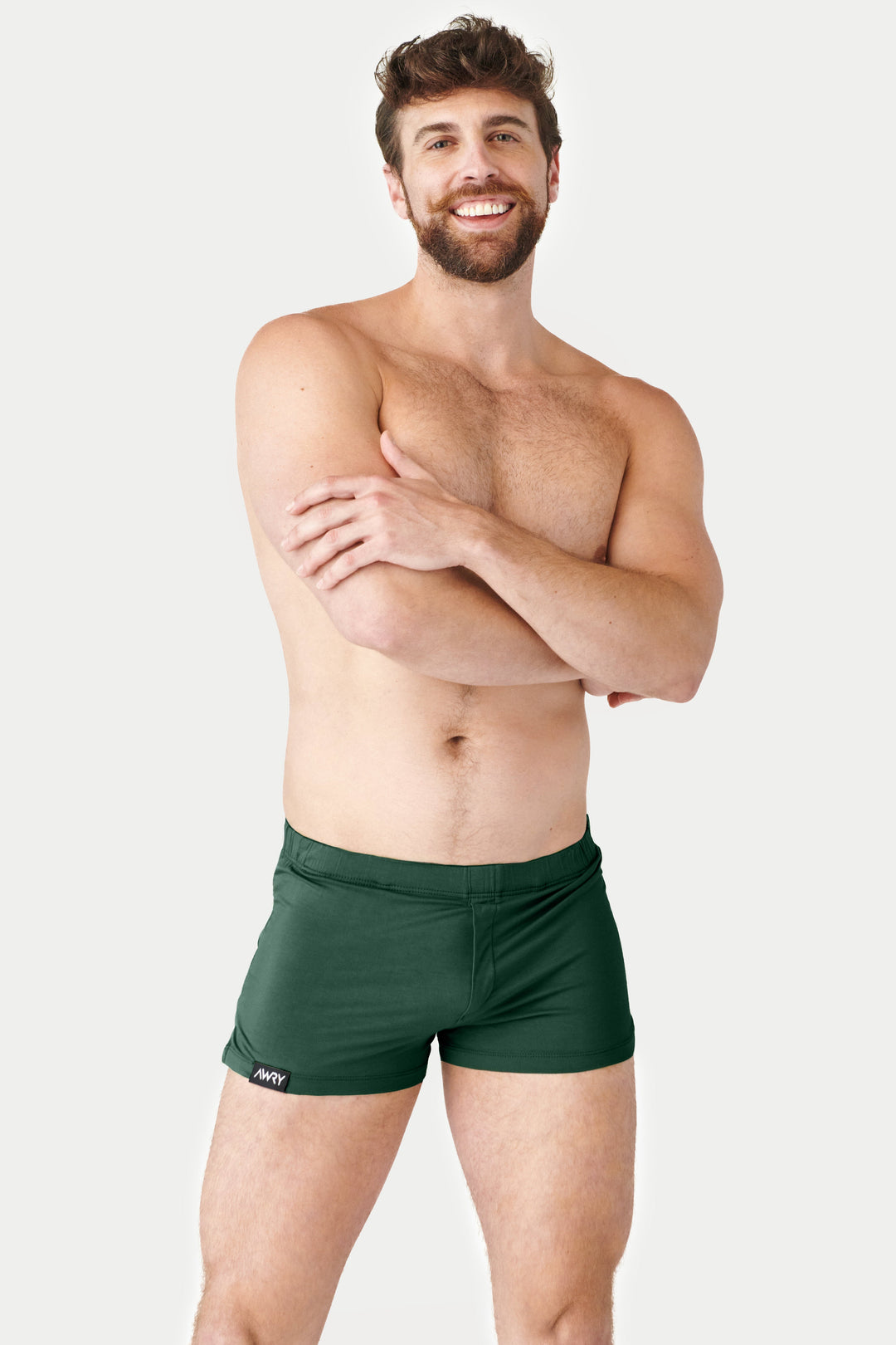 Man wearing green jock boxers with elasticated waistband and leg opening.