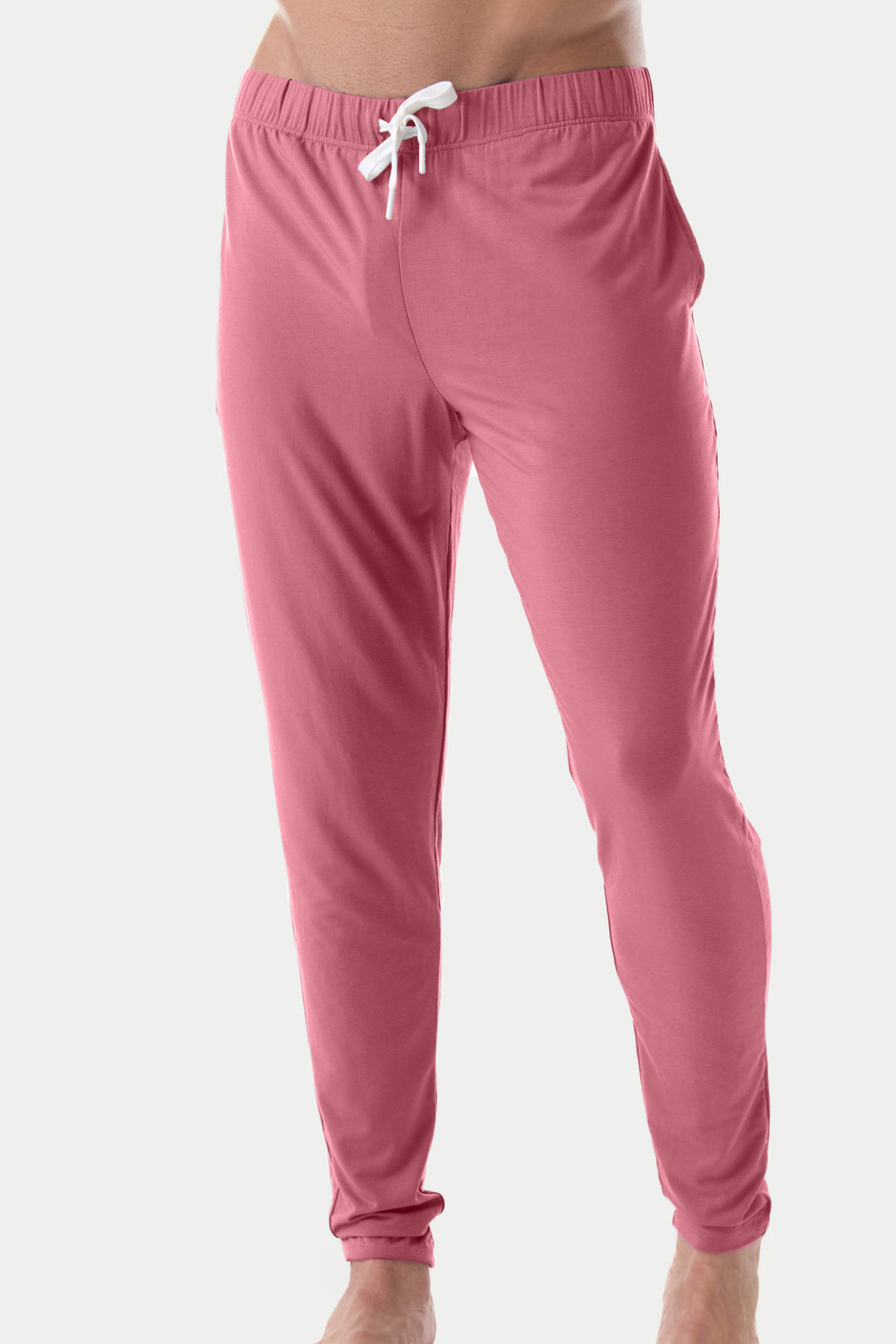 Blush red lounge pants with elastic waistband, white drawstring, and tapered ankles.