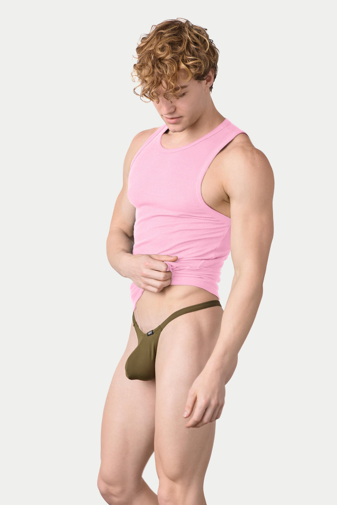Person wearing a pink ribbed sleeveless tank top with a crew neckline.