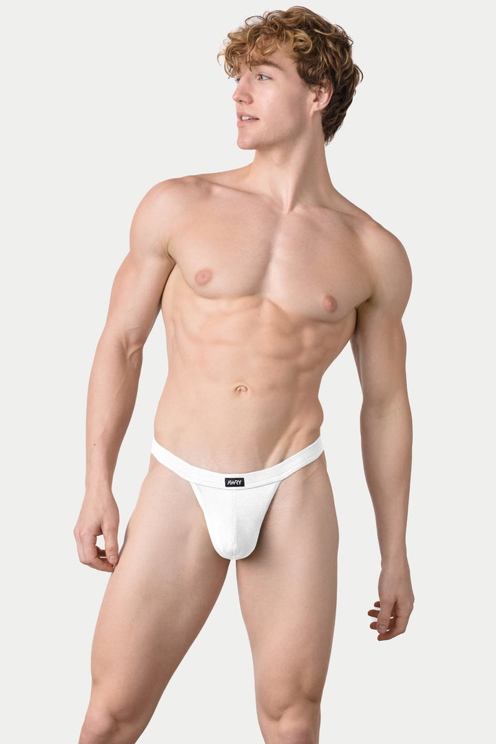 White ribbed thong with brand label on waistband, shown on male model.
