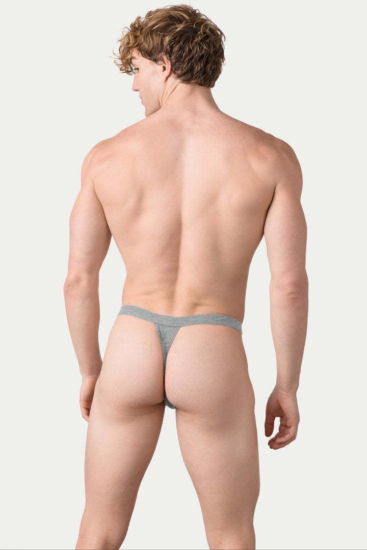 Heather gray ribbed thong with thin waistband, shown from back view on model.